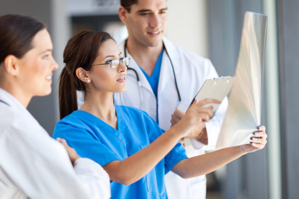 Doctors and medical students in clinical setting